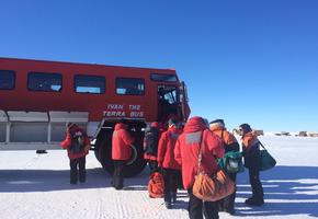 Taking Ivan the Terra bus to McMurdo Station